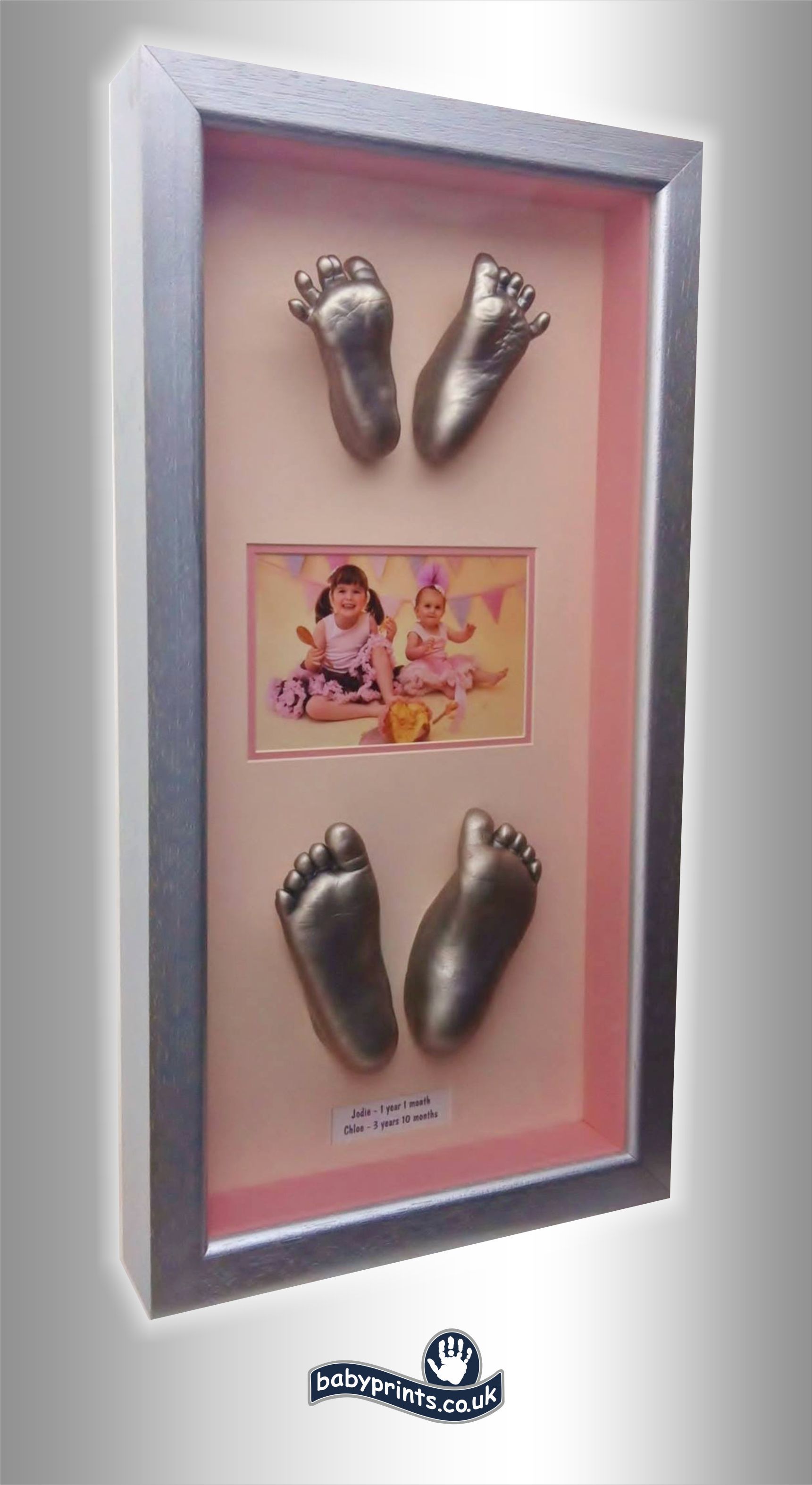 Sisters feet statues framed 